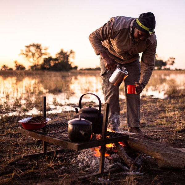 beagle expeditions kweene trails coffee (kyle de nobrega) coffe prepared on open fire being poured into mug