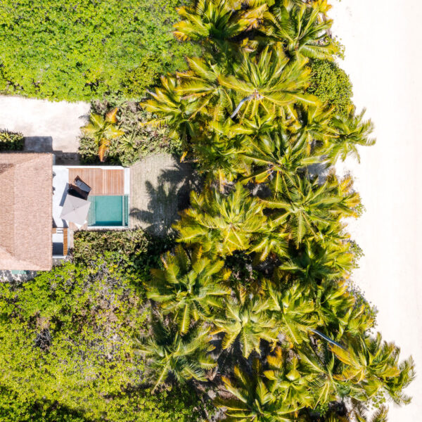 An aerial shot overlooking the 1-bedroom villa with direct access to the beach
