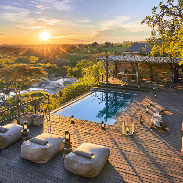 legendary expeditions mwiba lodge pool deck and sunloungers (hero)