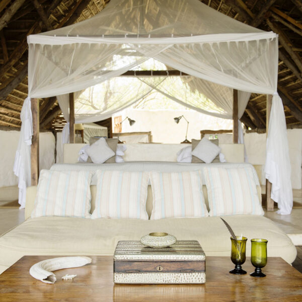nomad tanzania sand rivers, nyerere accommodation enormous double beds and airy bedrooms