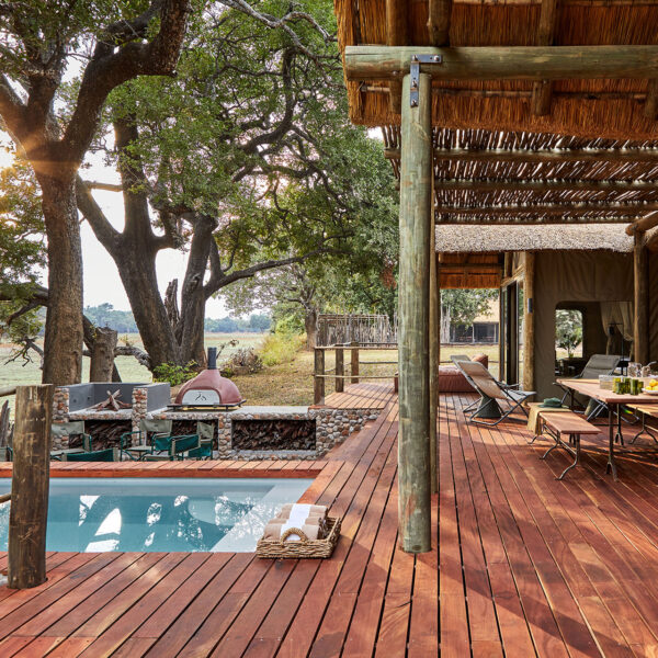 Deck, outdoor dining area, braai, plunge pool and pizza oven